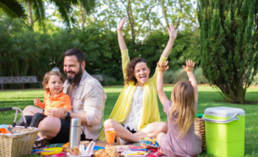 A family having a picnic in the park.